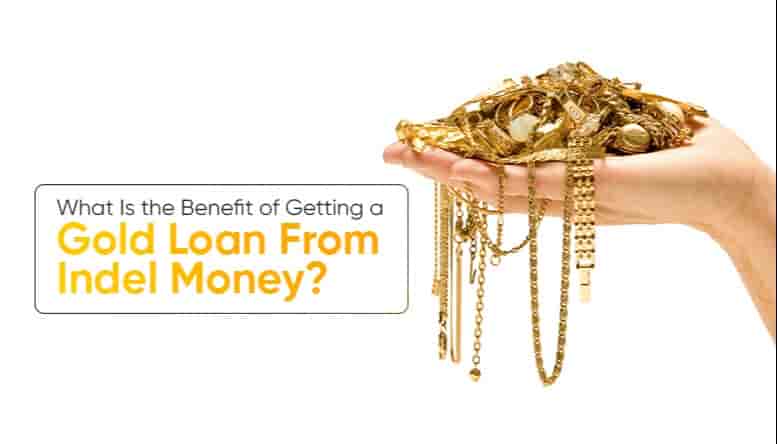 Hand holding gold jewelry with text about benefits of getting a gold loan from Indel Money in India