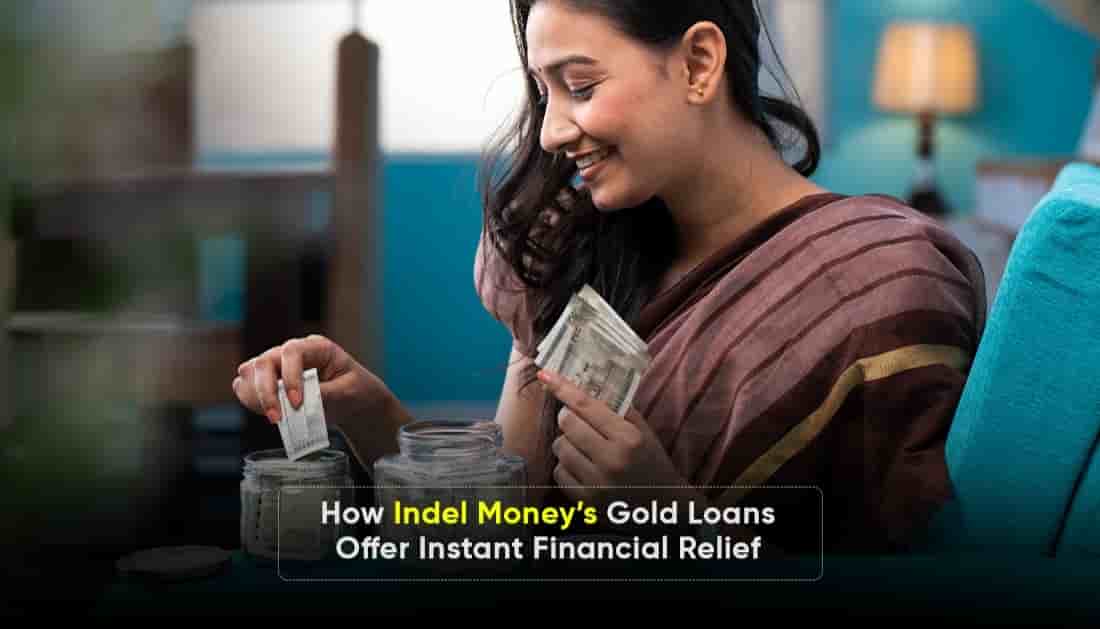 A smiling woman in a saree counting Indian currency notes and placing them in jars, symbolizing financial security through Indel Money’s gold loans that offer instant financial relief.