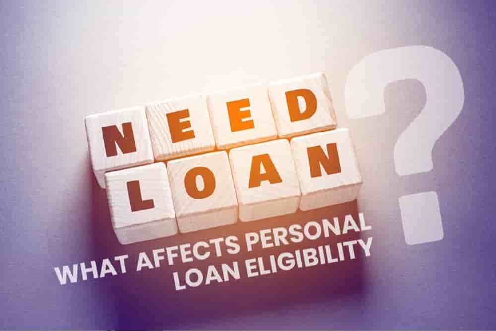 Wooden blocks showing ‘Need Loan’ and a question mark, representing factors that affect personal loan eligibility.