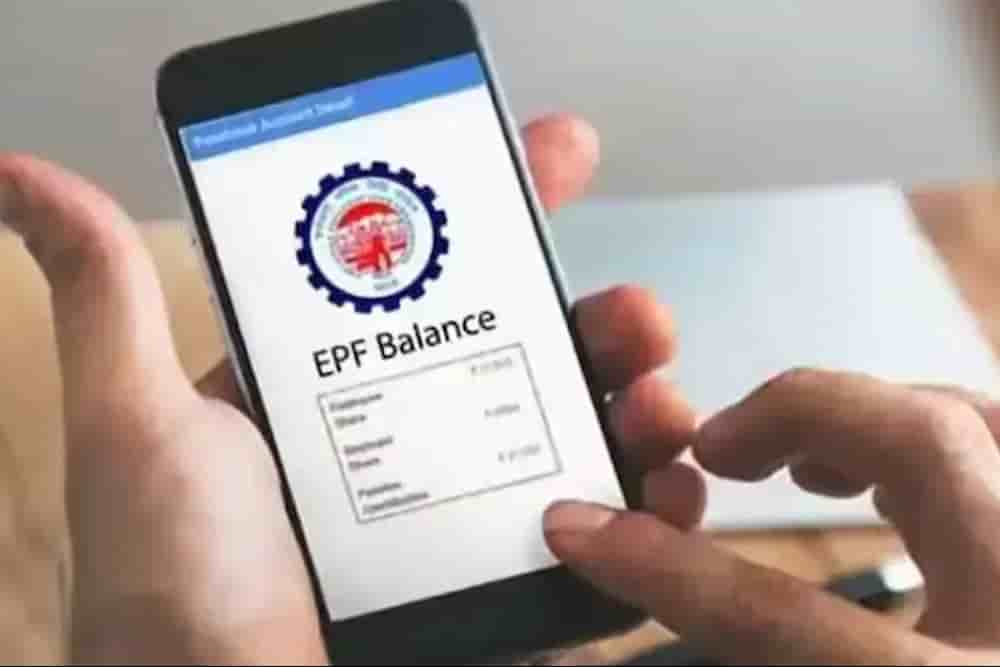 A person checking EPF balance on a smartphone, illustrating EPFO 3.0 modifications and new provident fund rules affecting employee savings in India.
